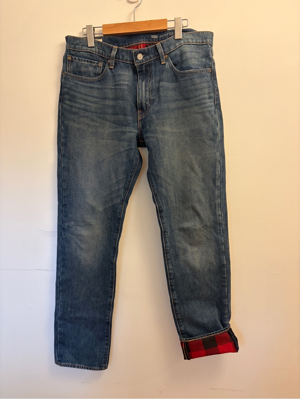 Levi’s Jeans with Red Plaid Lining